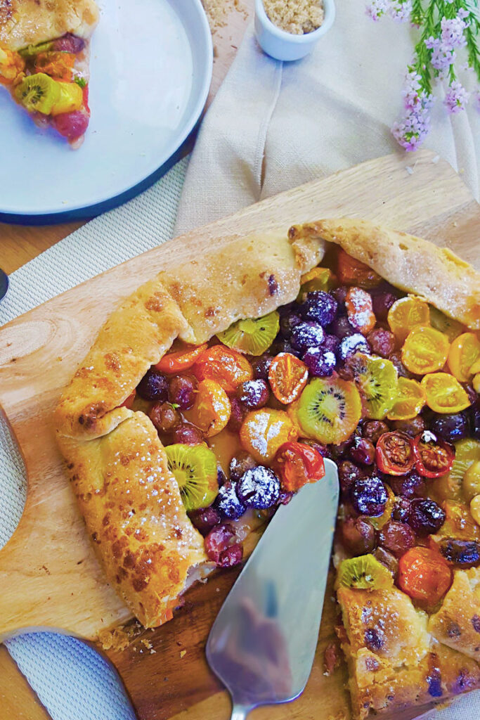 BAKED VEGAN GALETTE WITH TOMATOES, GRAPES, AND KIWI