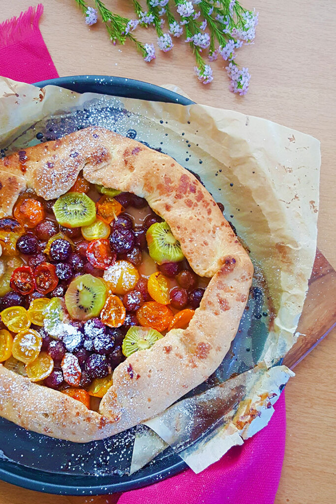 VEGAN GALETTE WITH TOMATOES, GRAPES, AND KIWI