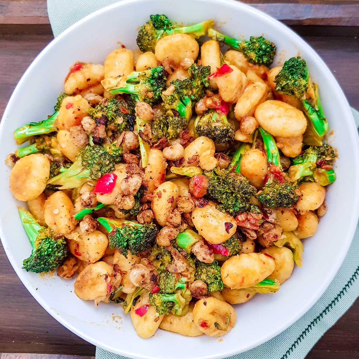 pan fried gnocchi with broccoli served in a bowl