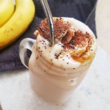 Banana Peanut butter smoothie in a glass jar