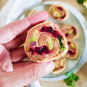 Vegan Pinwheels holding in hand