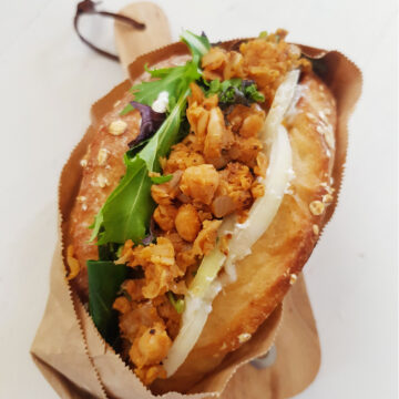 buffalo chickpea sandwich warped in paper