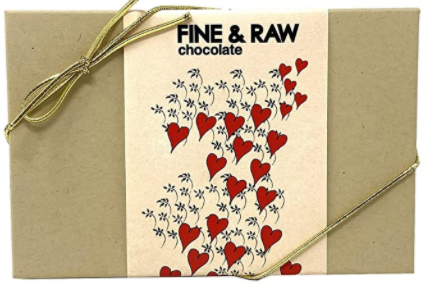 vegan chocolate paper box with printed red hearts on it