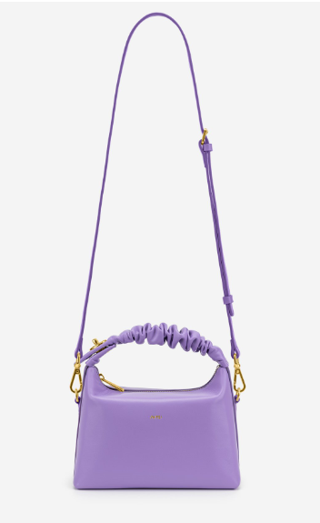 small purple color handbag with crossbody strap.