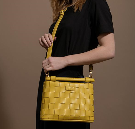 mustard color vegan crossbody handbag with handle and strap