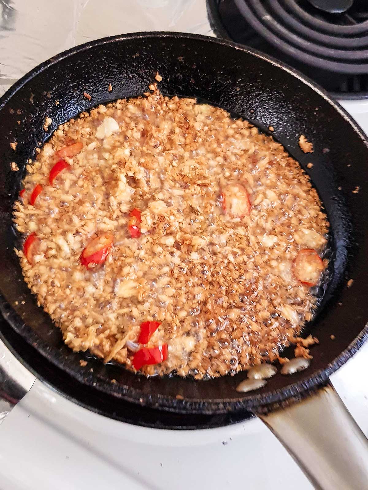 Preparing tardka for dal