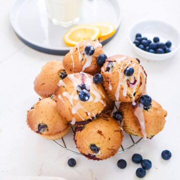 Vegan Blueberry lemon Muffins placed on a steel rack