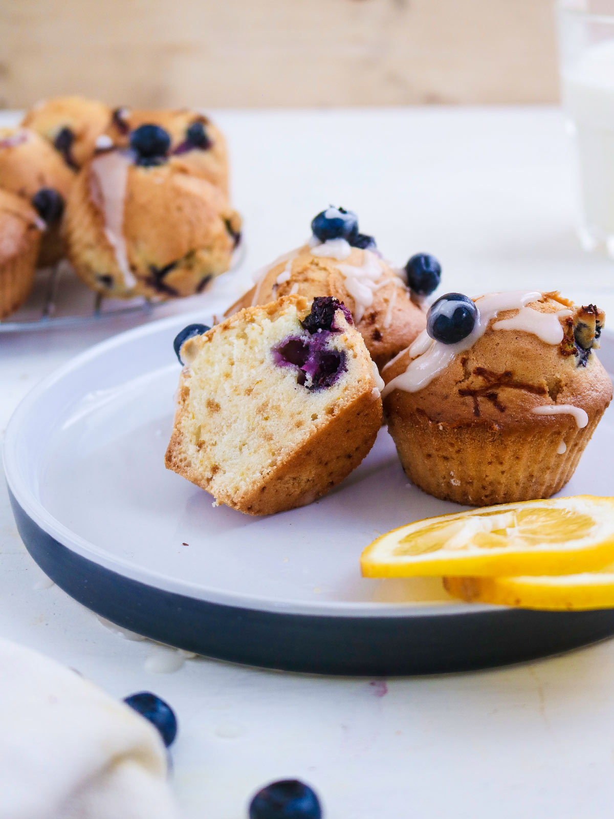 Muffin sliced in half served on a plate 