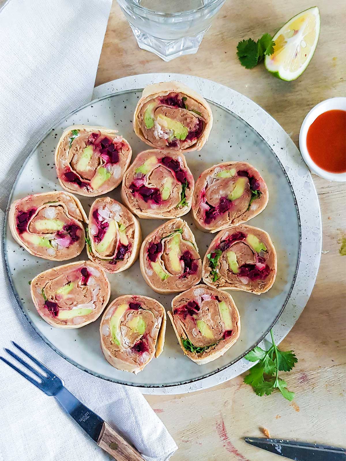 Vegan pinwheels served in a plate