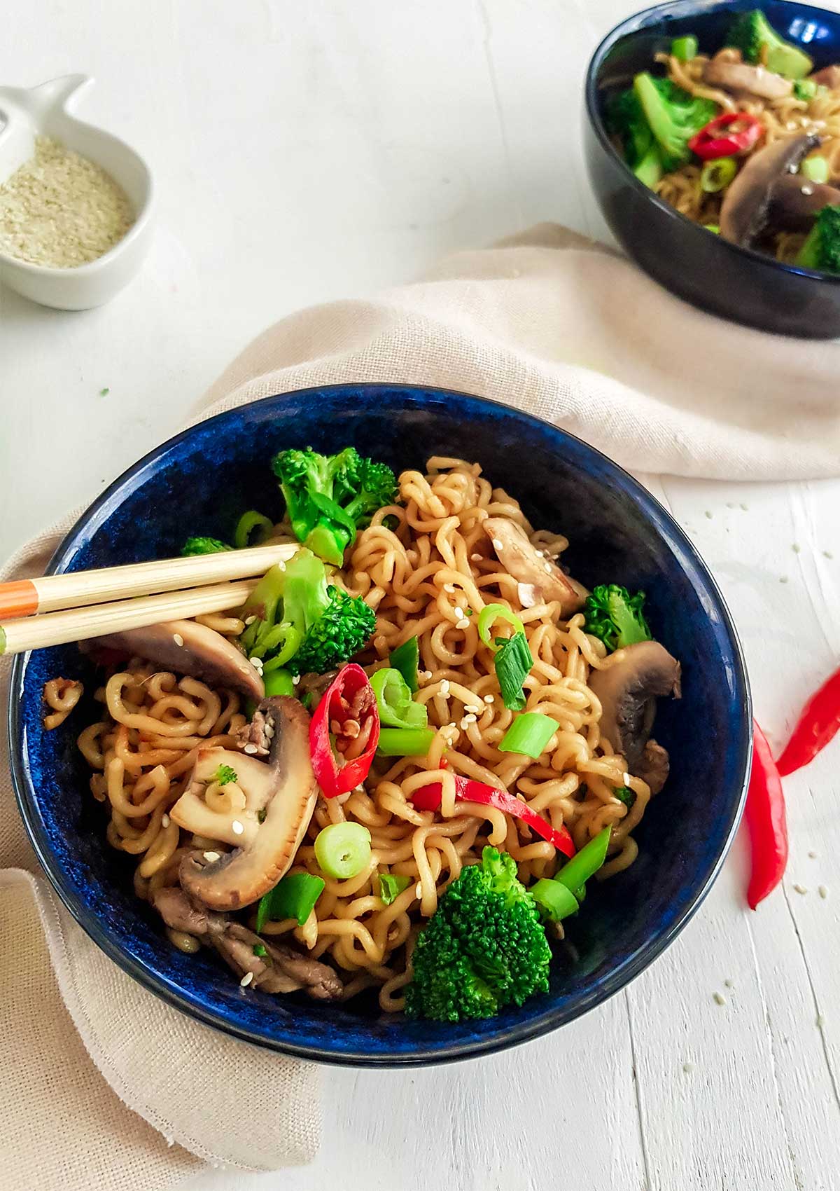 Ramen served in a bowl with veggies