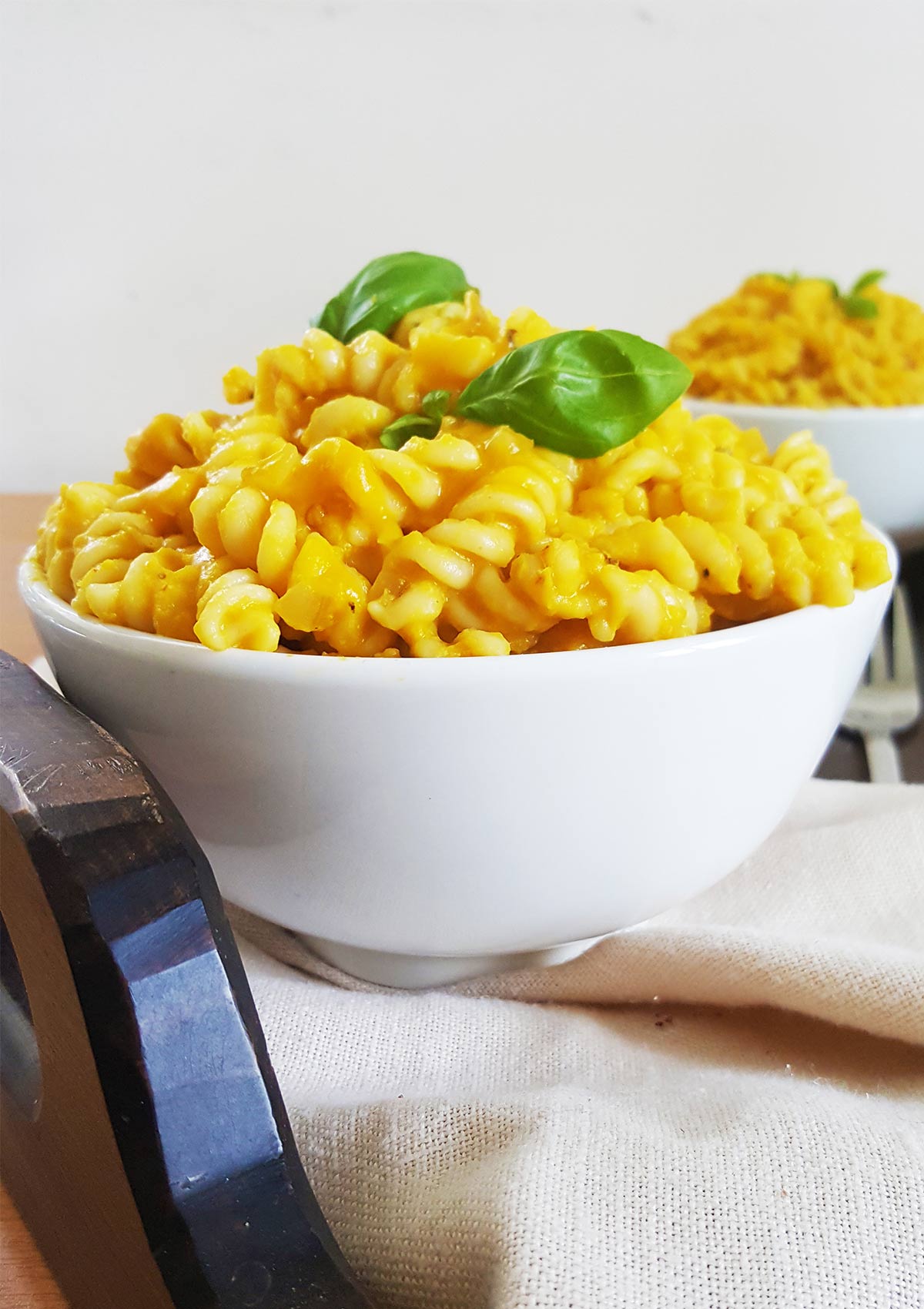 Vegan Pumpkin pasta served in a white bowl