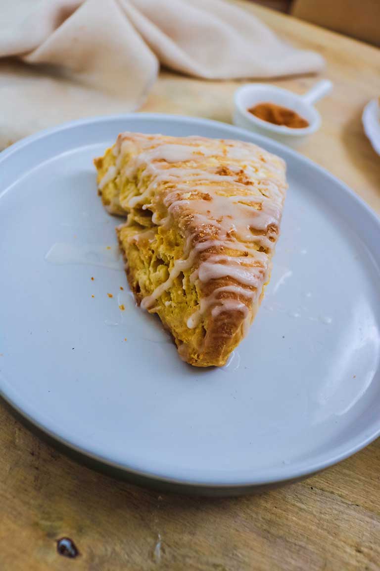 pumpkin scone served in a white plate