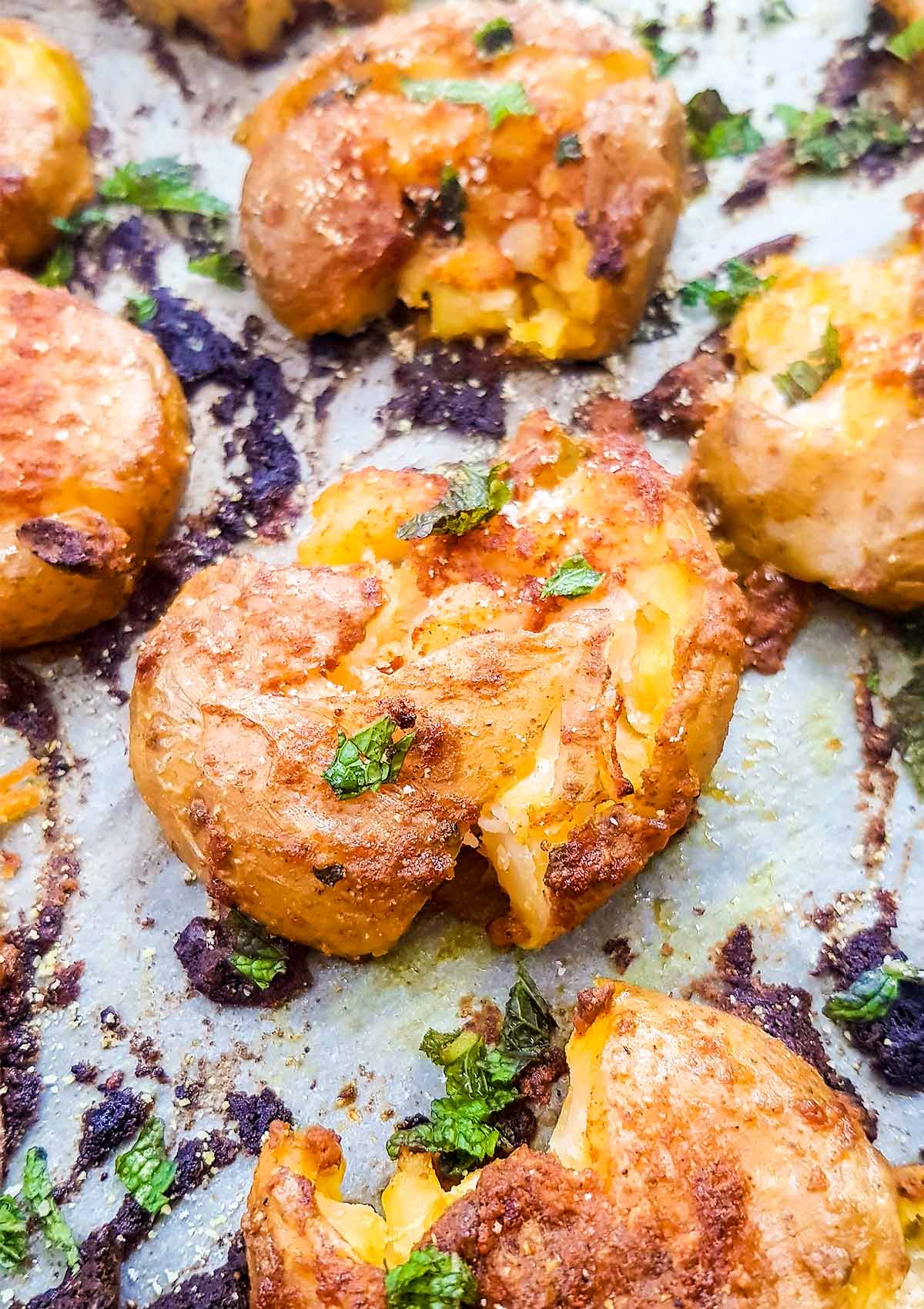 vegan smashed potatoes on tray