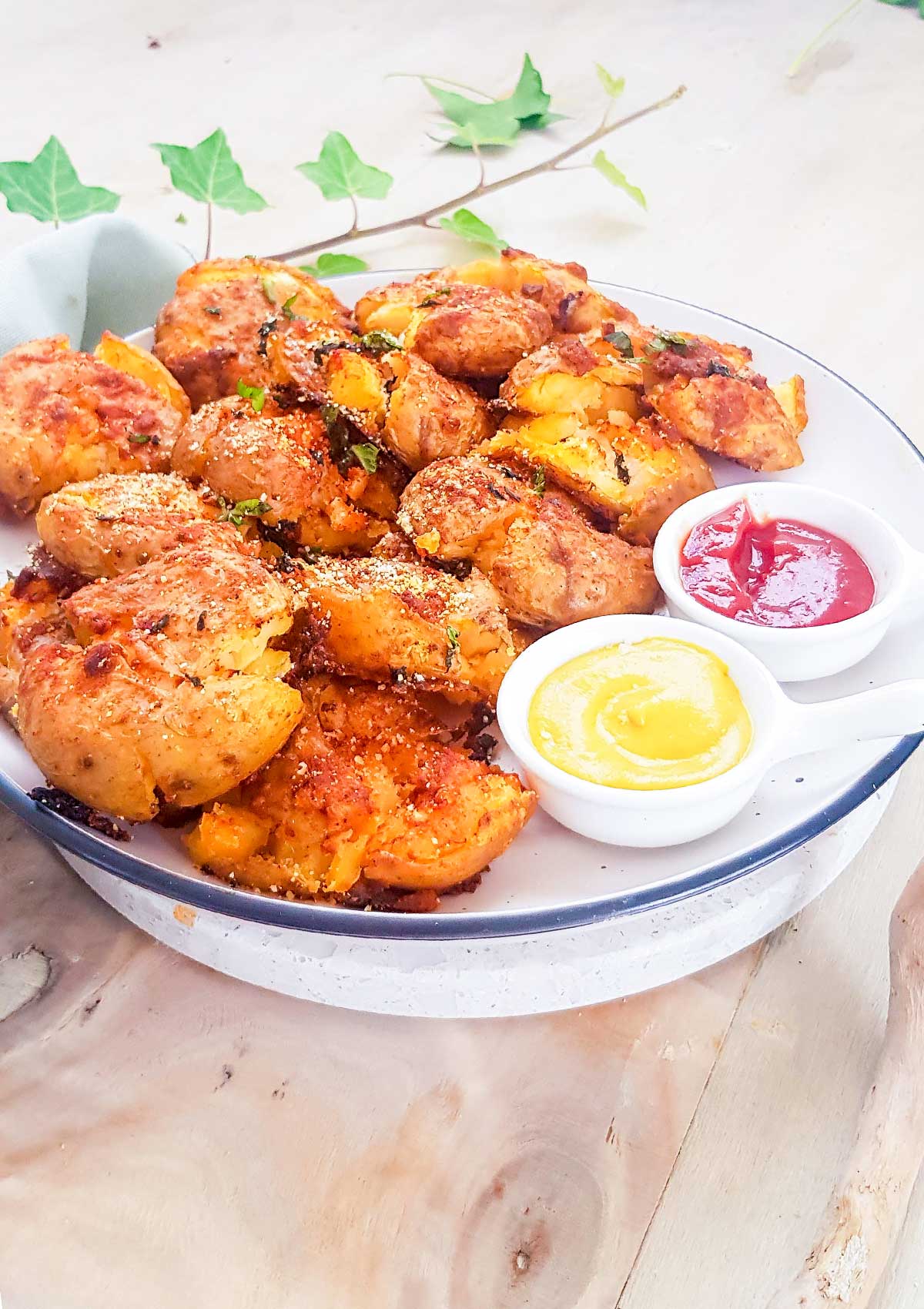 smashed potatoes served with dipping sauces