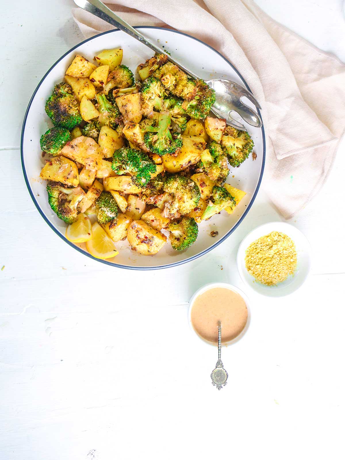 vegan parmesan and spicy tahini dressing for serving