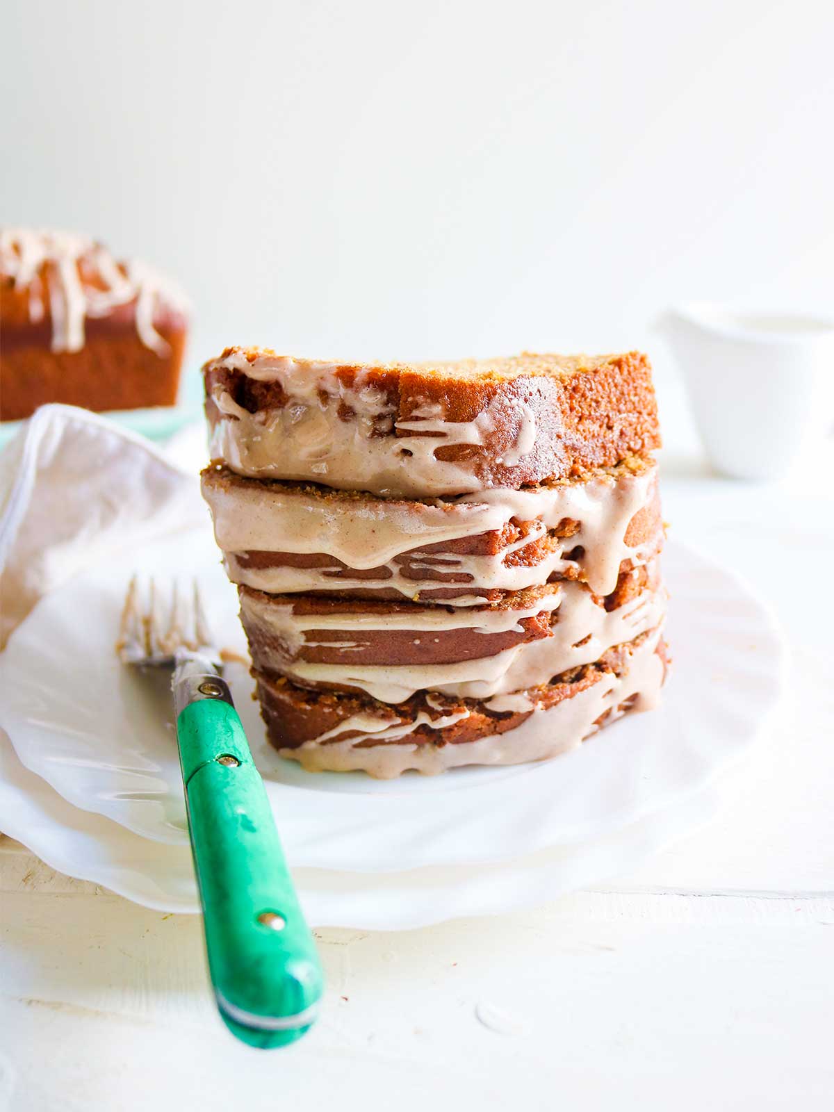 vegan pumpkin banana bread slices stack and a fork