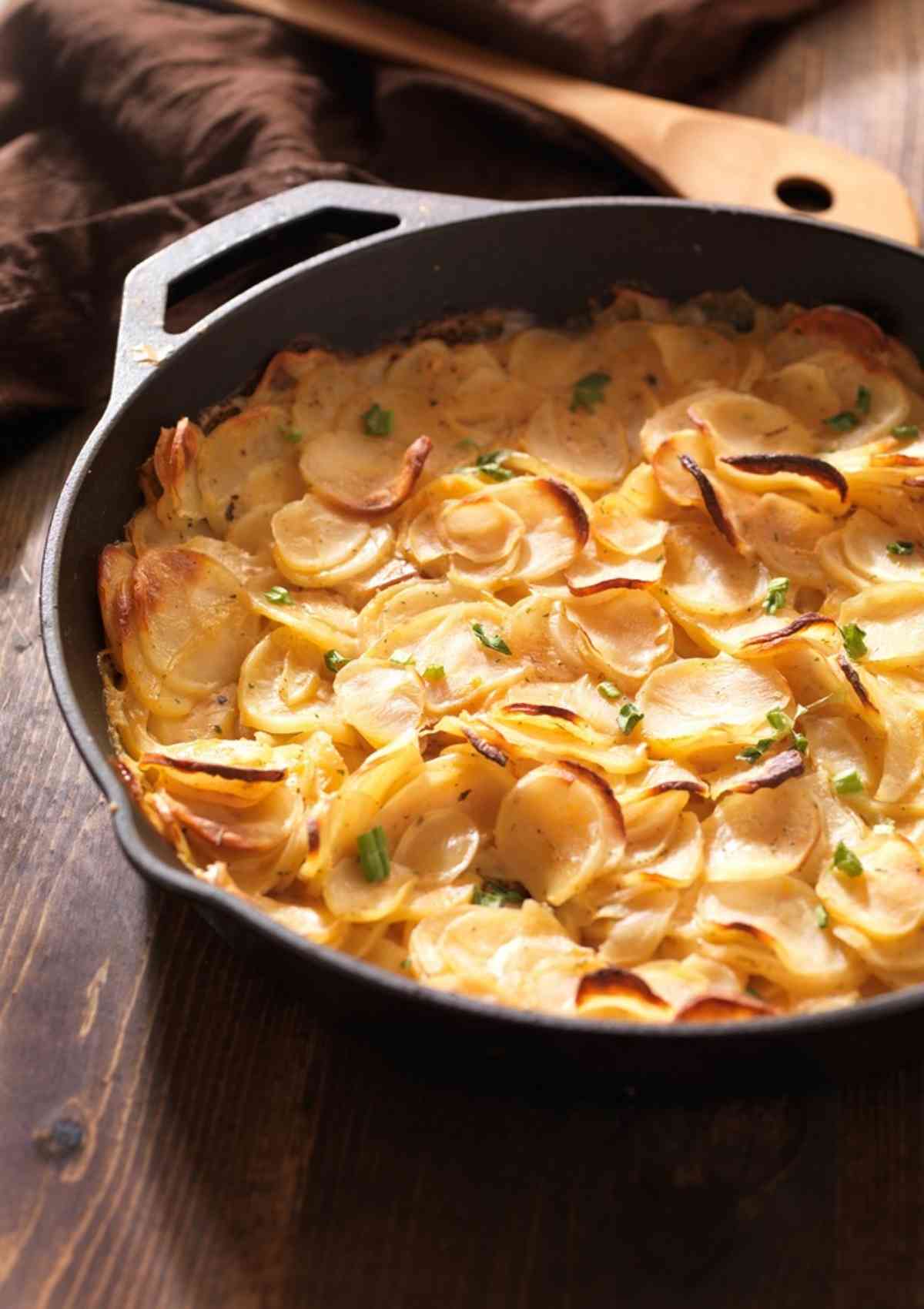 Dauphinoise Potatoes in cast iron pan