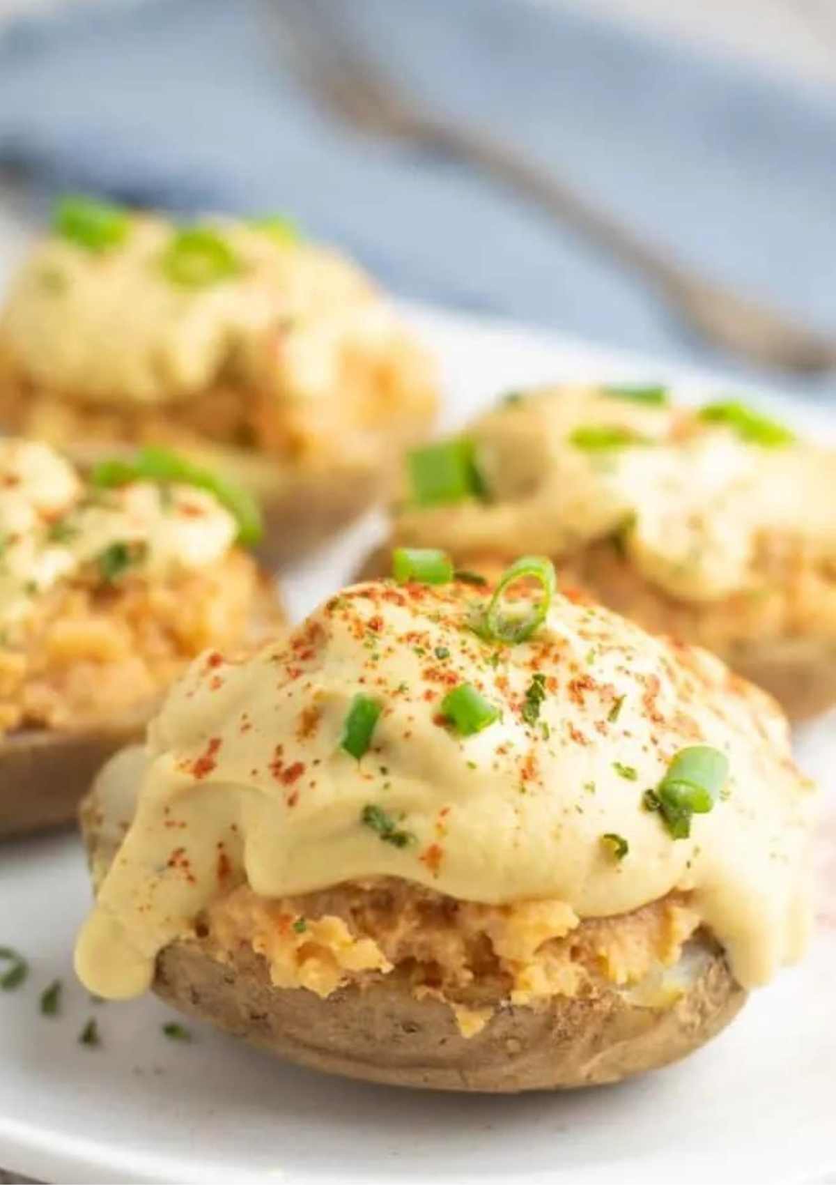Baked potato topped with cheese