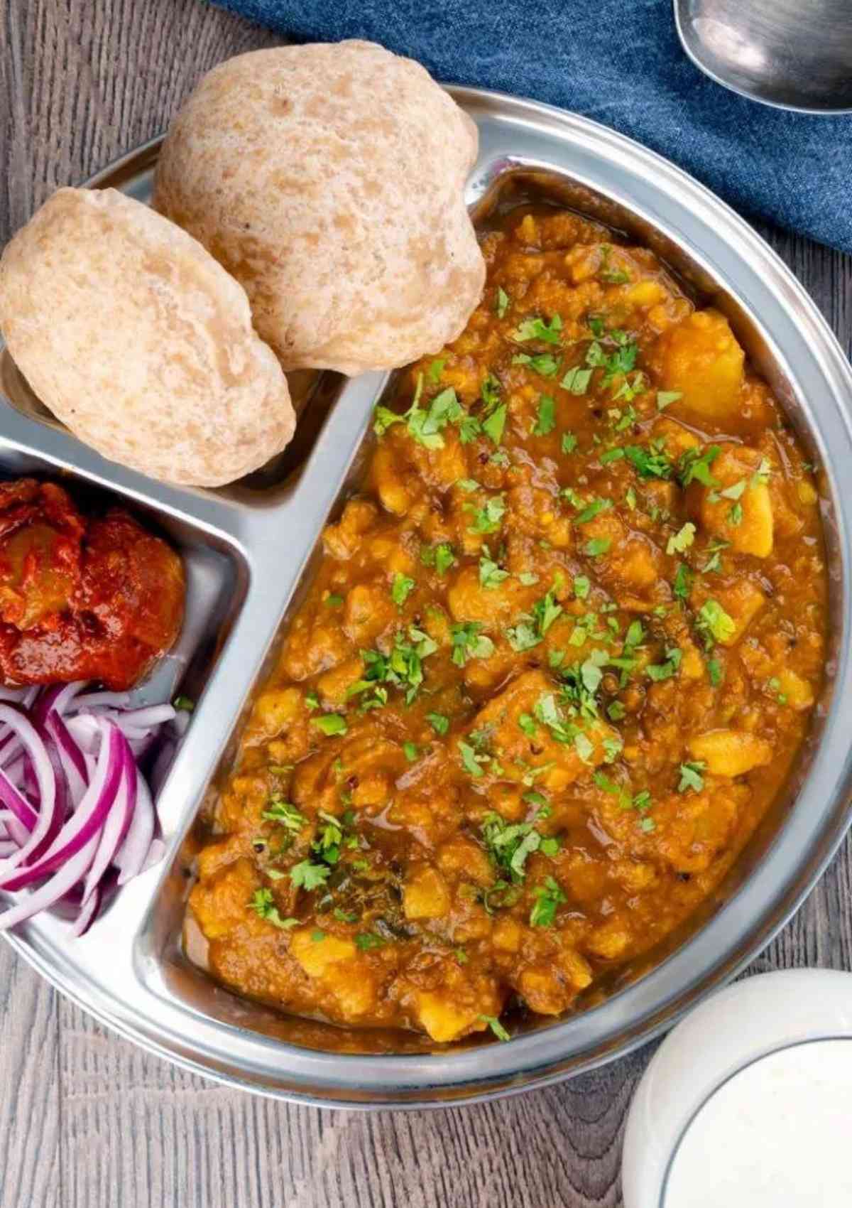 Potato curry in a steel plate 