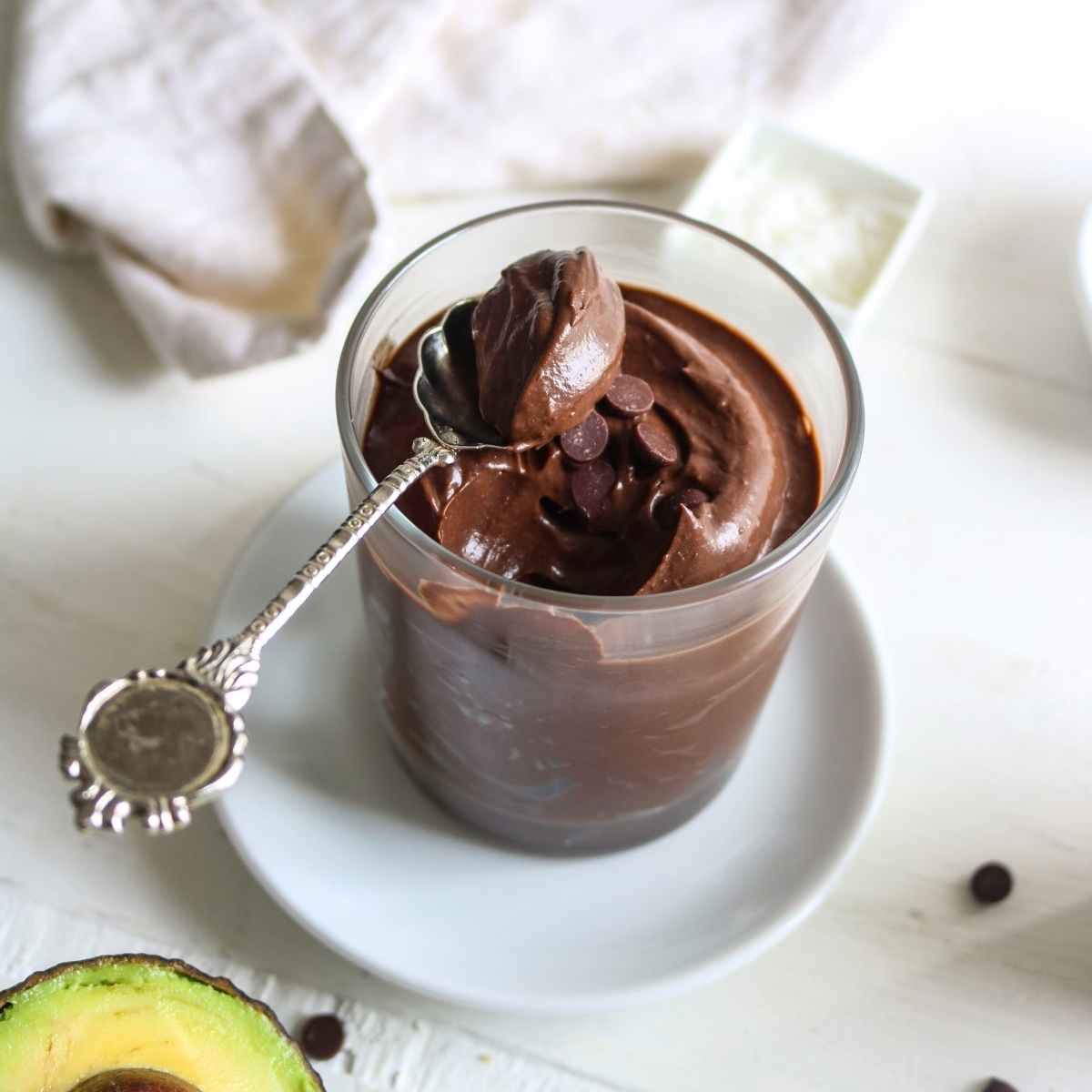vegan chocolate avocado mousse served in a glass
