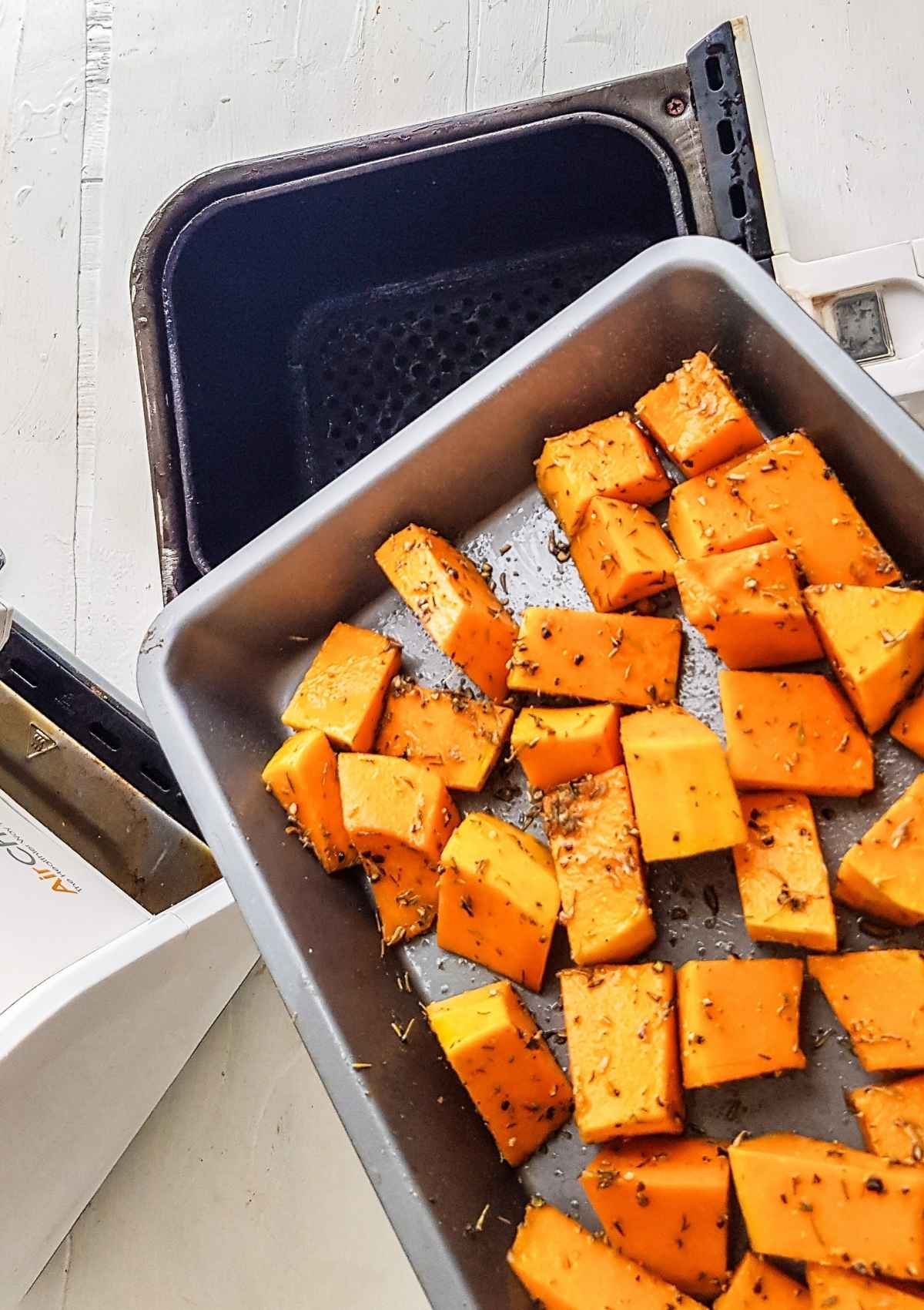 seasoned squash ready to cook in airfryer.