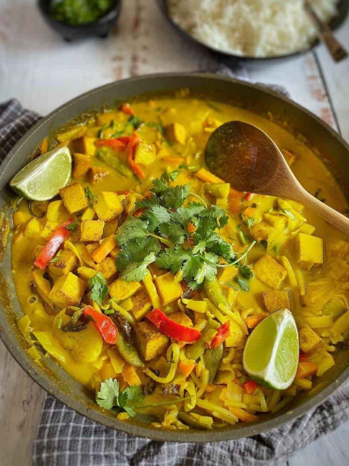Yellow color Thai curry in a pan.
