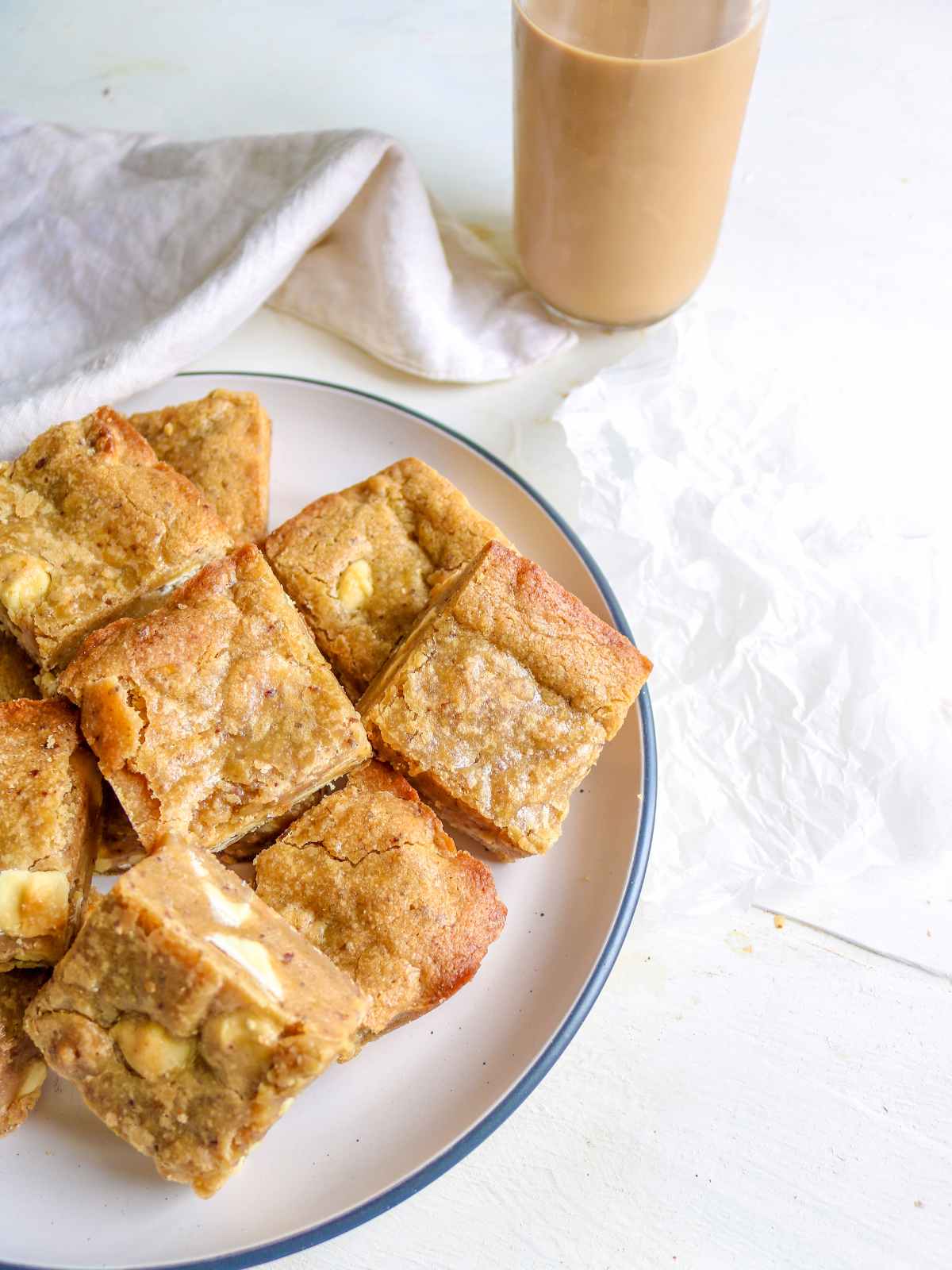 eggless blondies served in a white plate.