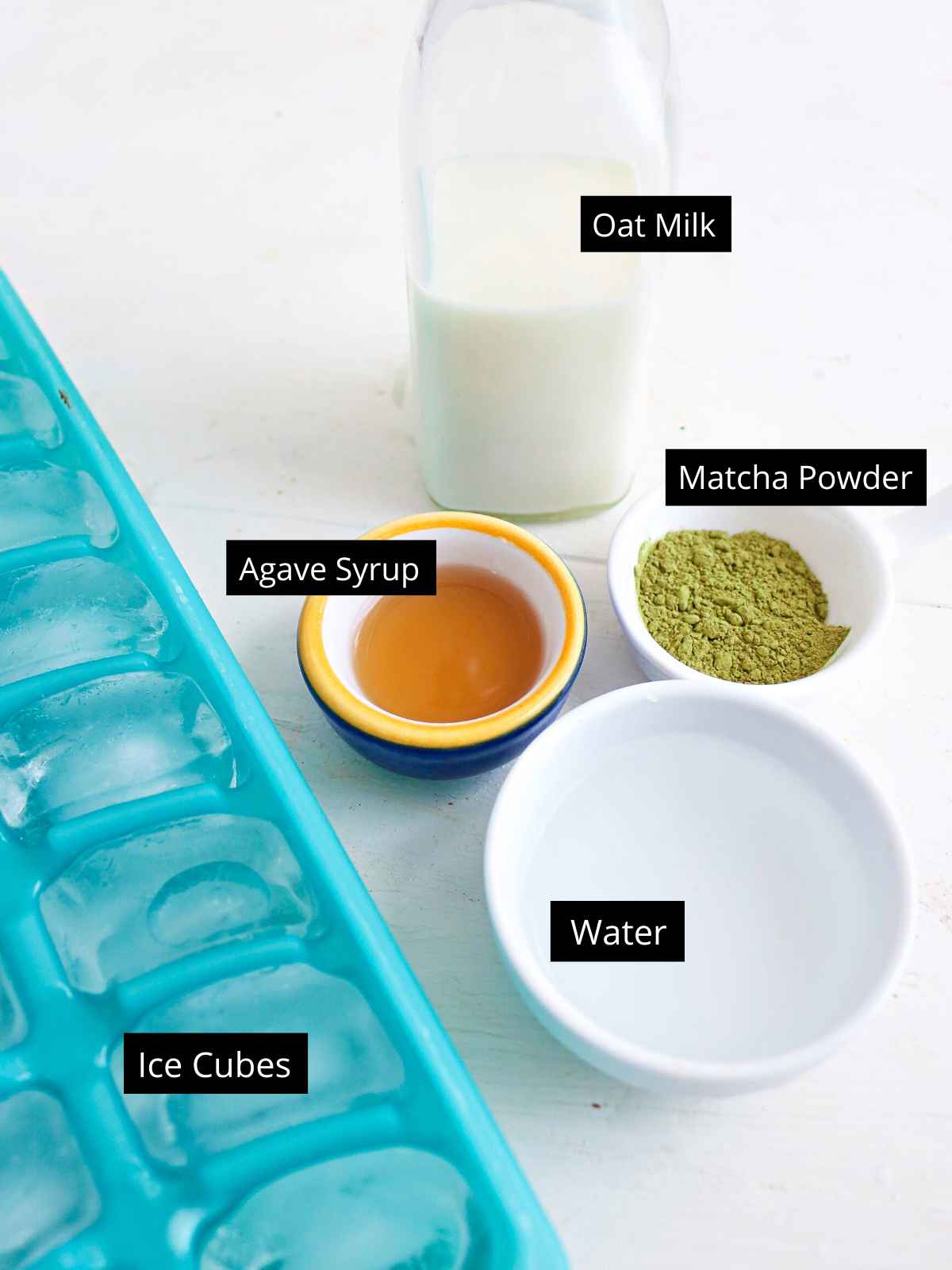 Ingredients of matcha latte with tags
