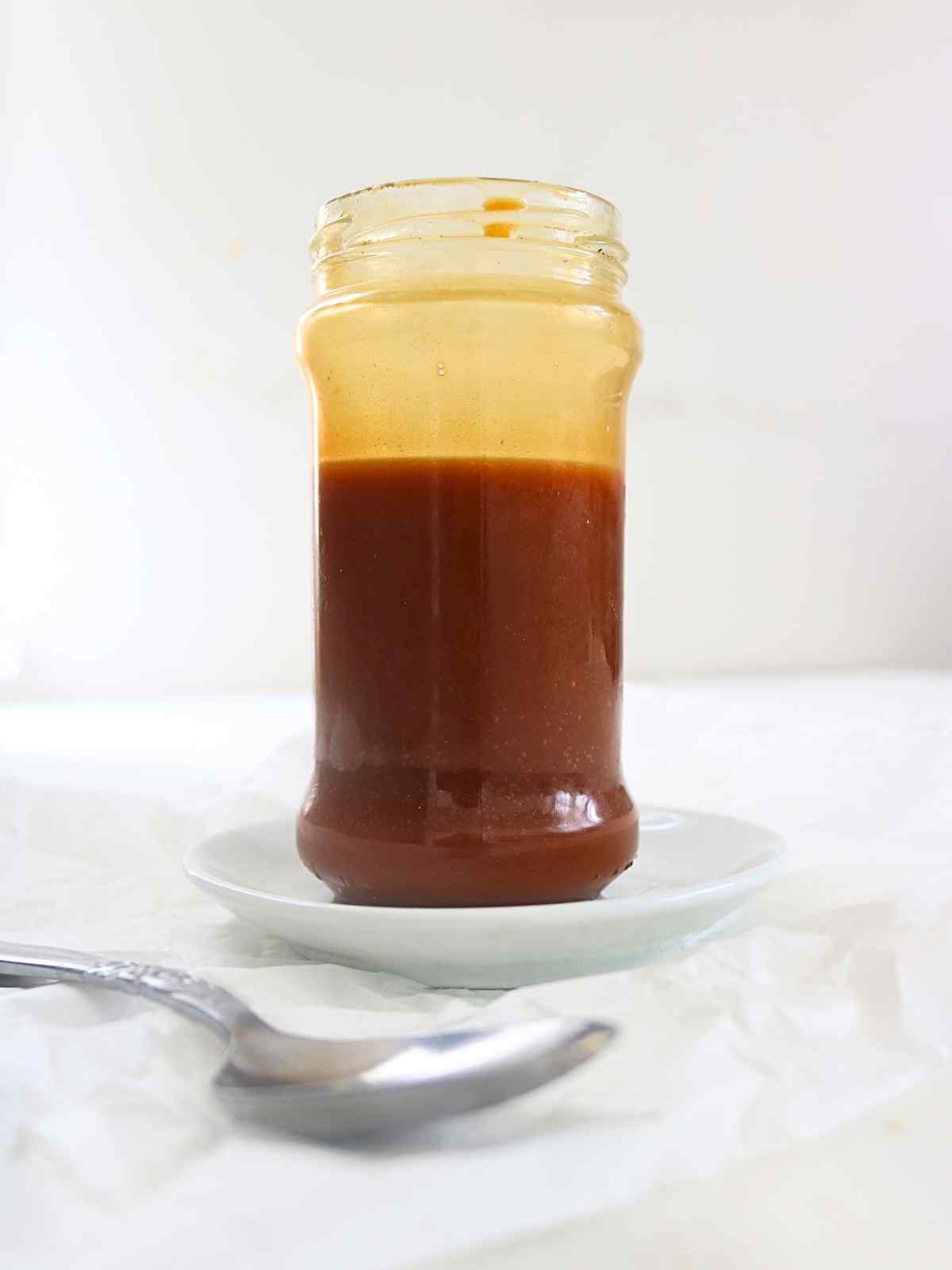Vegan salted caramel served in a glass jar.