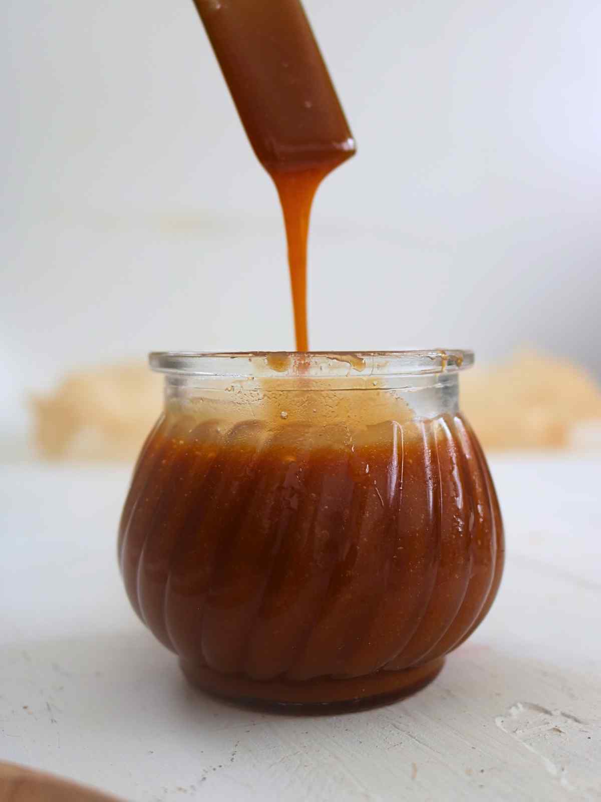 Storing salted caramel in a jar.