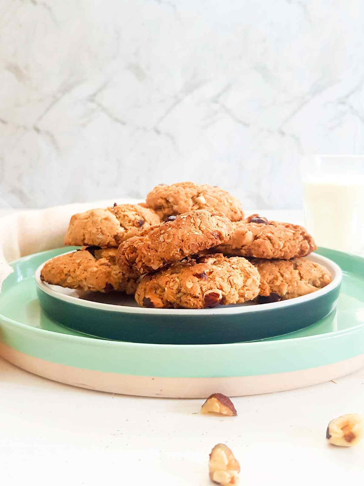 side view of peanut butter oat meal cookies on a plate.