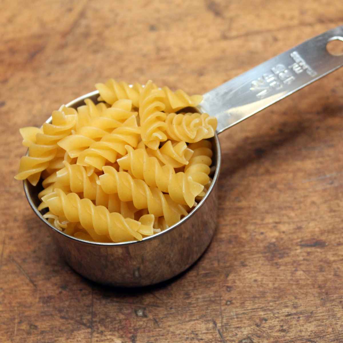 Pasta in a measuring cup.