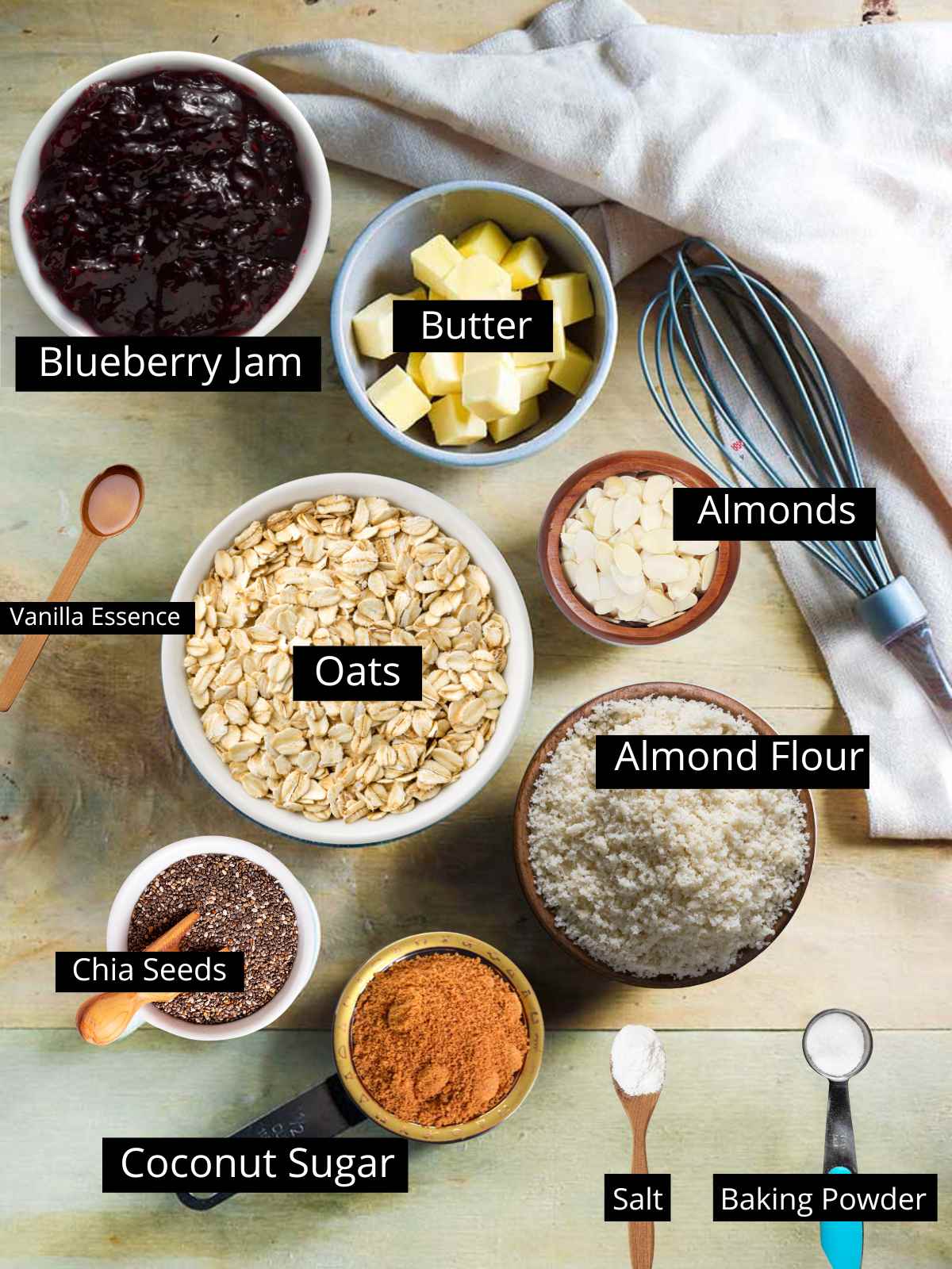 Ingredients to make jam crumb bars with text tags