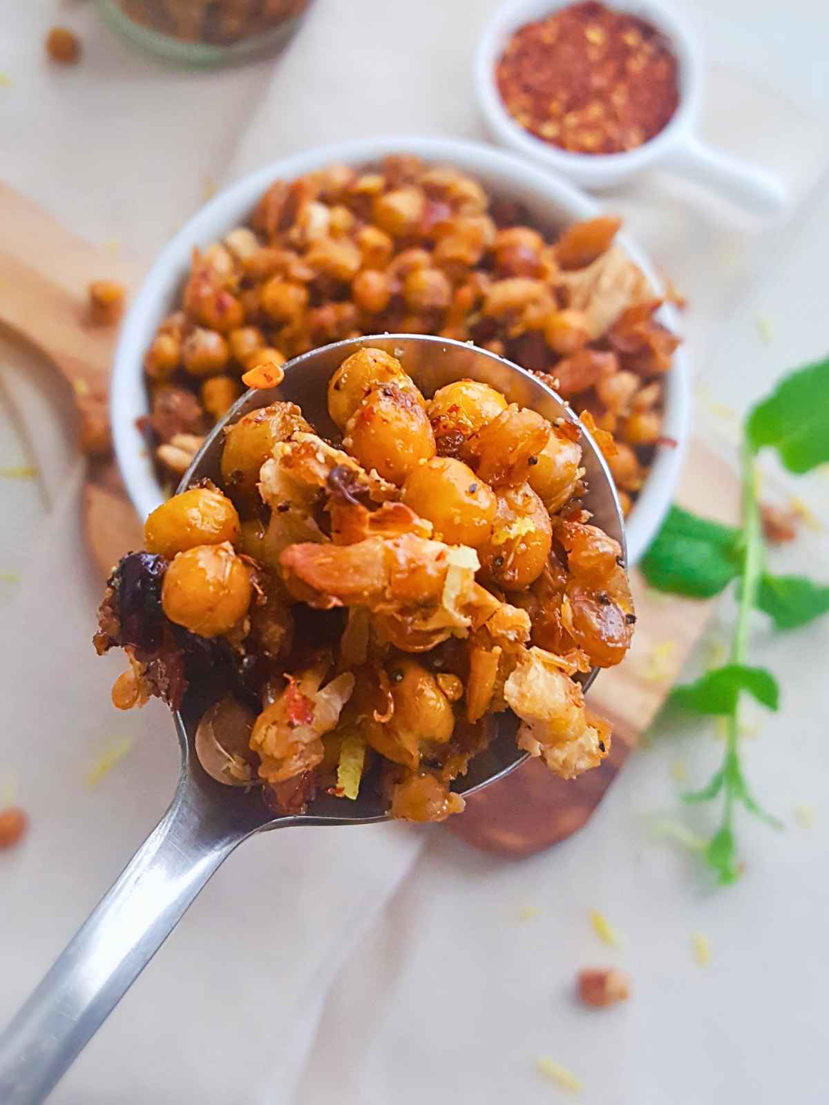 crispy beans snack on a spoon.