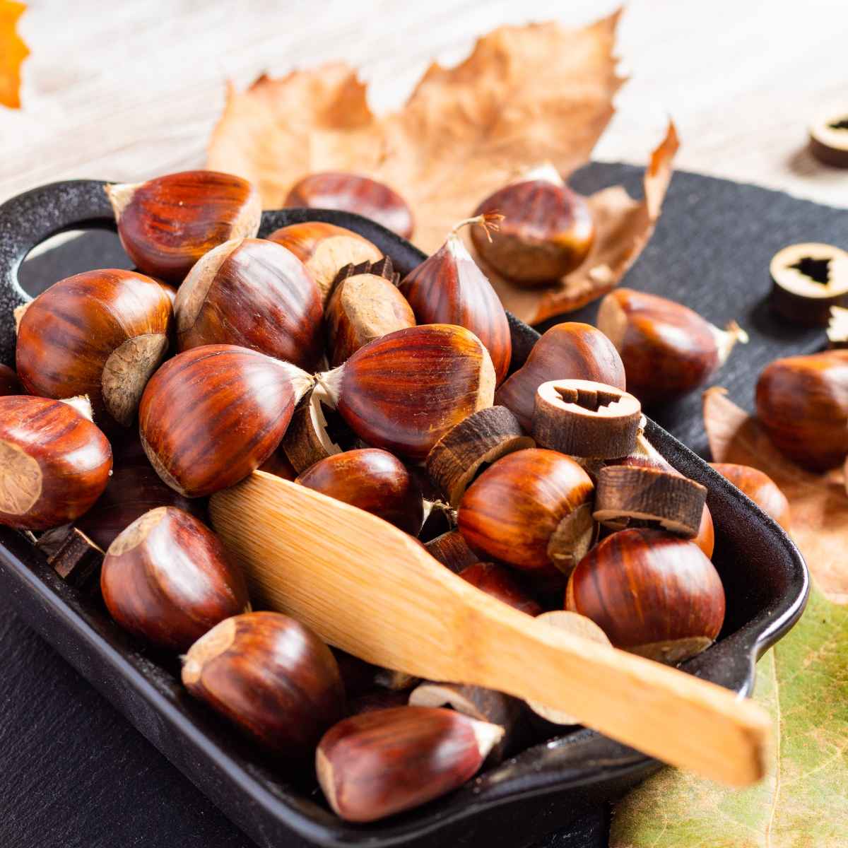 water chestnuts in a wooden tray.