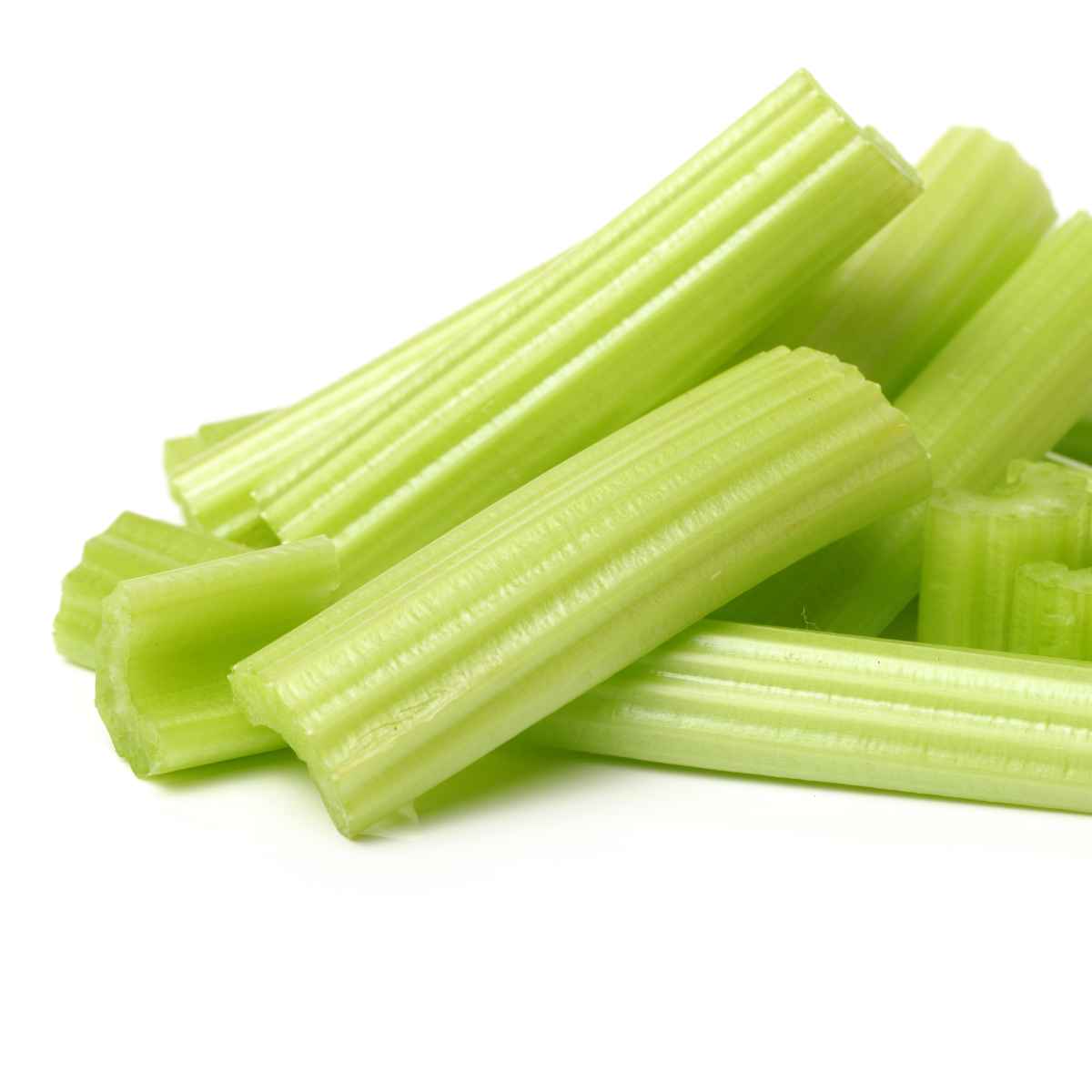 celery sticks on a white background.