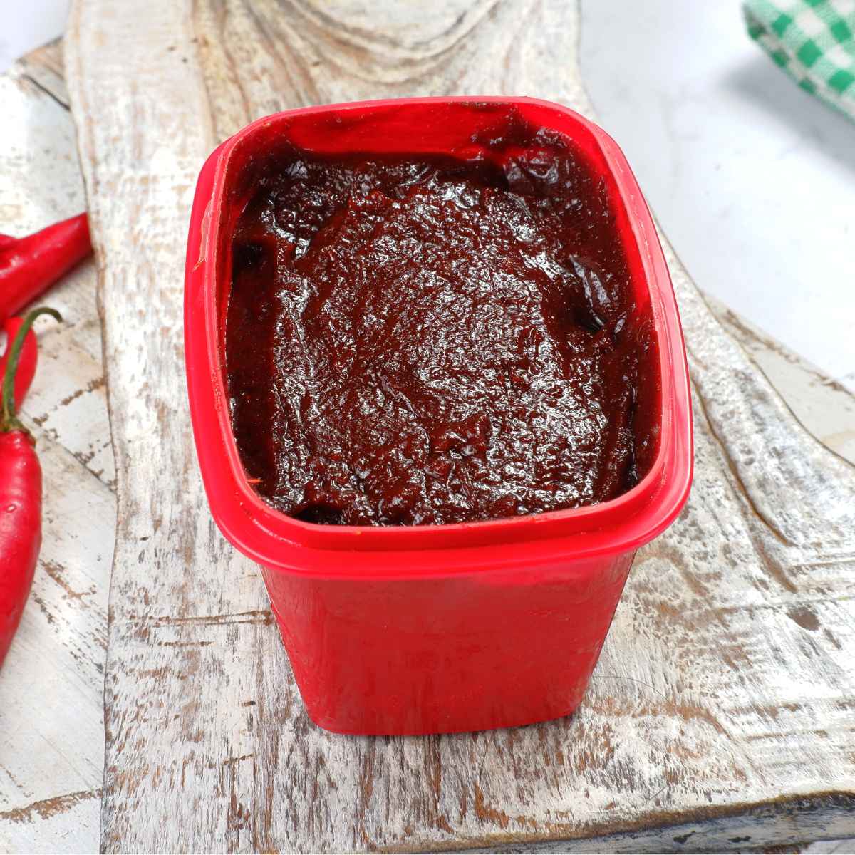 Gochujang paste in red color box.